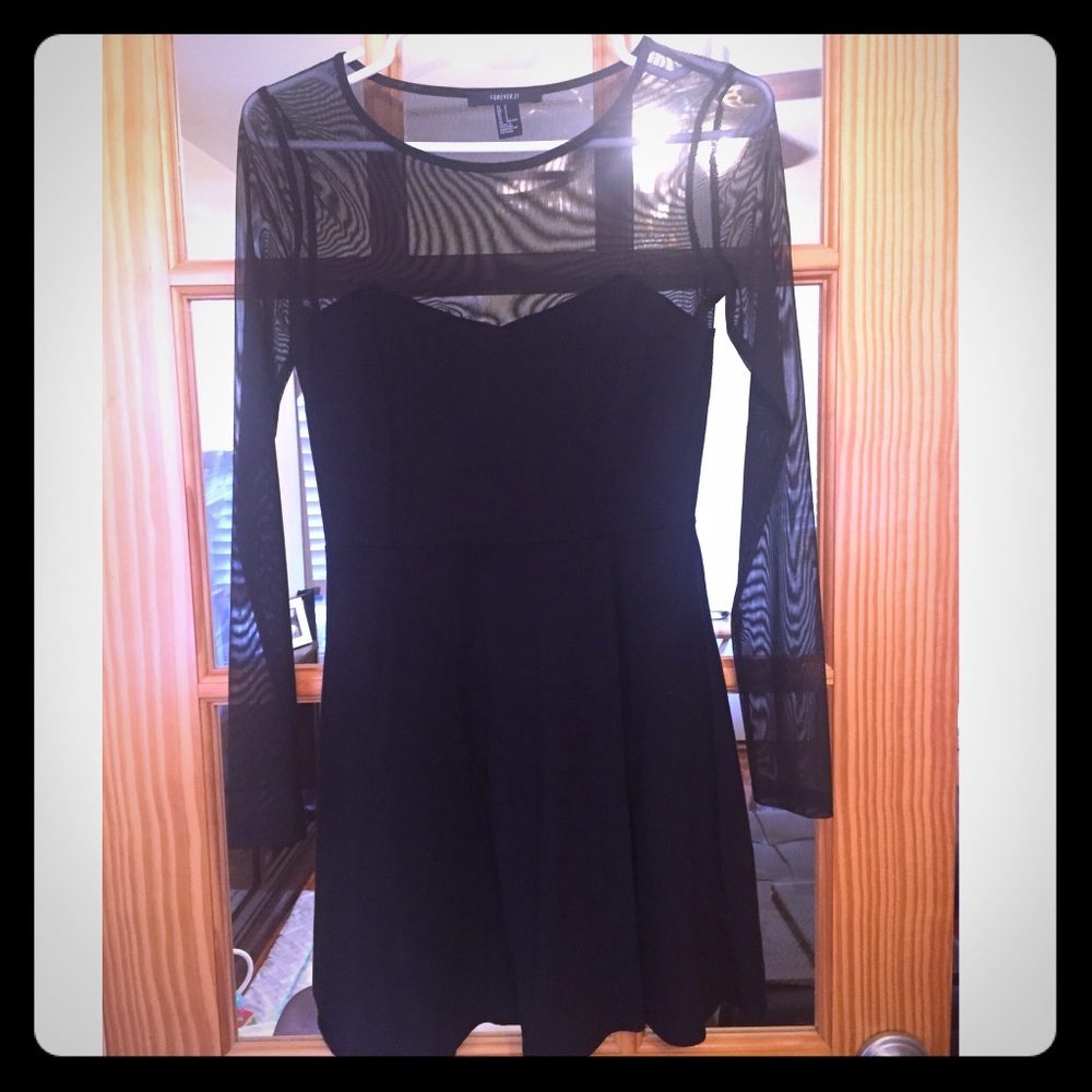 Black cotton dress with mesh sleeves